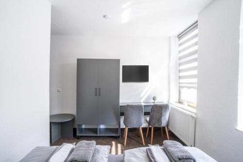 Postel nebo postele na pokoji v ubytování Duisburger Hostel
