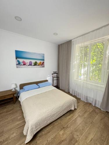Postel nebo postele na pokoji v ubytování Apartment For Guests with Soul