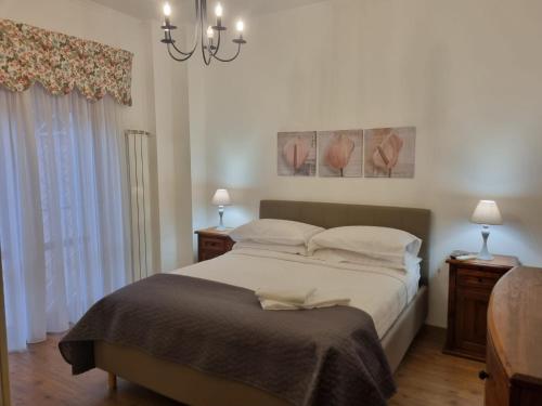 Postel nebo postele na pokoji v ubytování Alakarà Suite