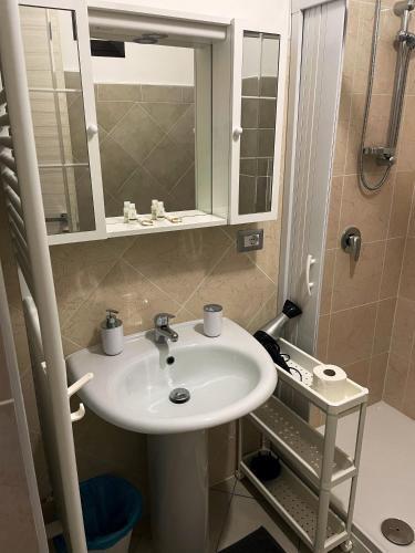 a bathroom with a sink and a mirror at Dimora Nuscana in Nusco