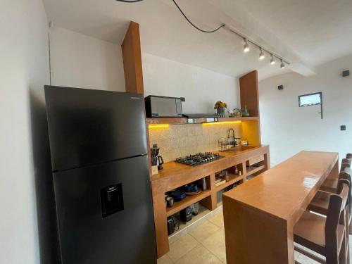 Kuchyň nebo kuchyňský kout v ubytování Casa Sofi Oaxaca