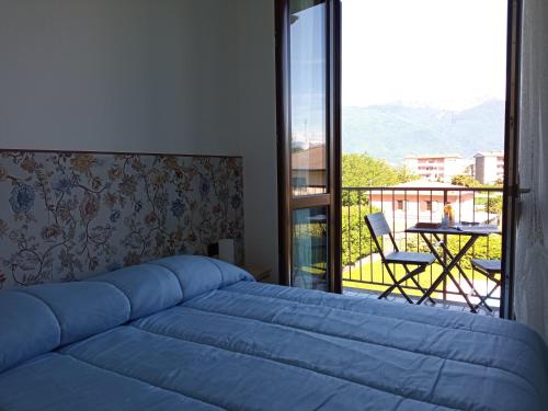 Ένα ή περισσότερα κρεβάτια σε δωμάτιο στο Casa Ines