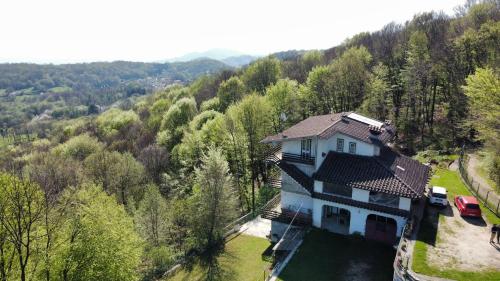 an aerial view of a house in the woods at Villa Ambra in Vigolo