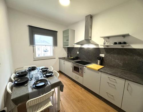 Η κουζίνα ή μικρή κουζίνα στο Apartamento Playa Foz 3 Dormitorios & Terraza
