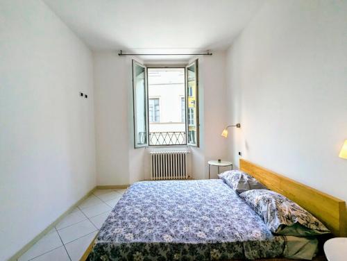 Postel nebo postele na pokoji v ubytování Casa Degli Osci