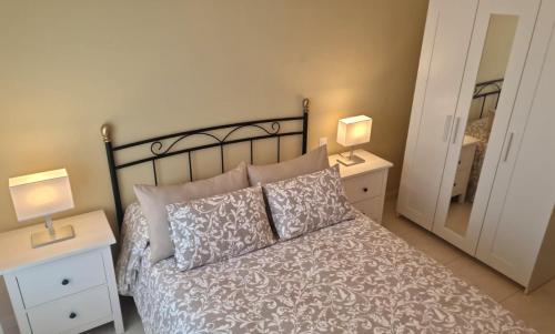 Cama o camas de una habitación en El Jardín de Amos