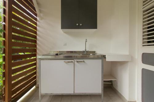 Kuchyň nebo kuchyňský kout v ubytování Orcéa & Spa Séjours Ecofriendly