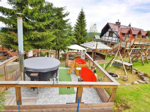 a park with a playground with a play equipment at Ośrodek Jagienka Zieleniec in Duszniki Zdrój