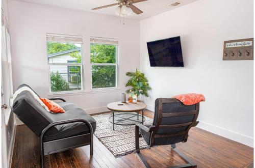 a living room with two chairs and a table at Cozy and Gorgeous 2BR1BA Near Amazing Downtown in San Antonio