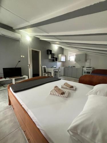Postel nebo postele na pokoji v ubytování Apartman Sava
