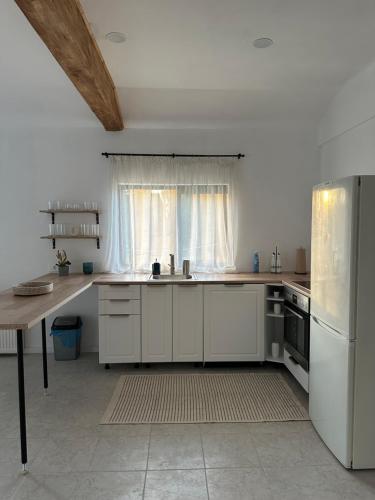 Kuchyň nebo kuchyňský kout v ubytování Cottage Bytheriver