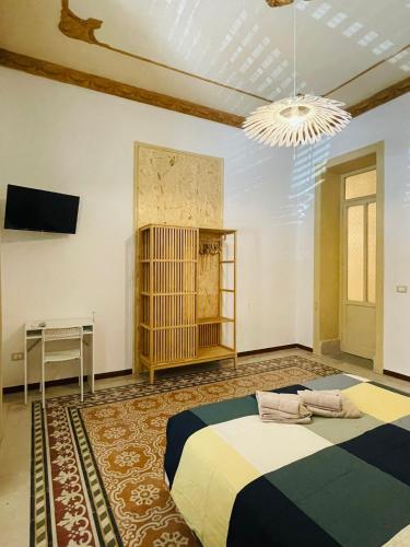 Postel nebo postele na pokoji v ubytování Olivuzza Rooms in Apartment