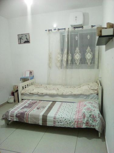Una cama o camas en una habitación de Sun&sea