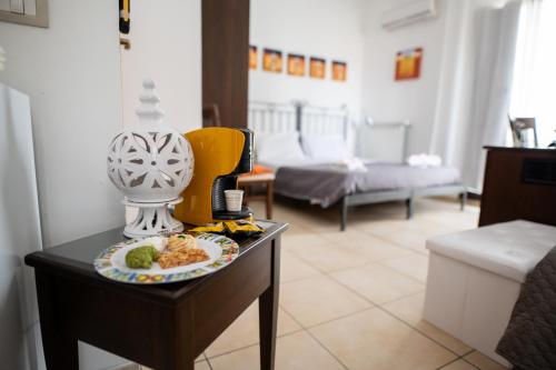 Postel nebo postele na pokoji v ubytování B&B Regina Carolina