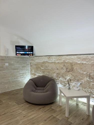 Télévision ou salle de divertissement dans l'établissement Pietra Viva room