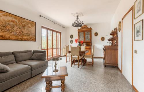 a living room with a couch and a table at 3 Bedroom Nice Home In Fivizzano in Fivizzano