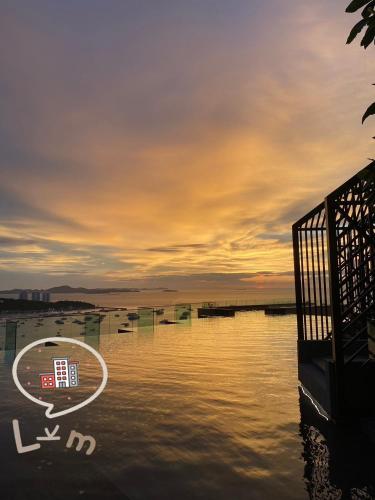 a view of a body of water at sunset at The Central Pattaya High Floor, Pattaya City in Pattaya Central
