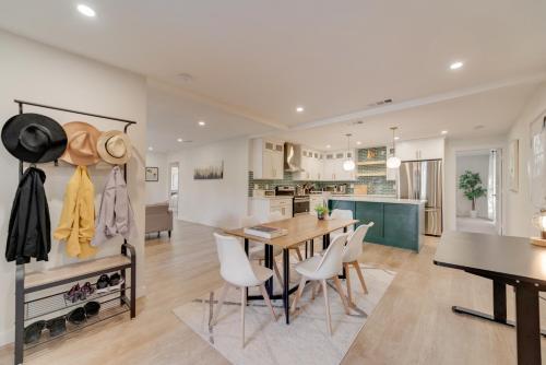 a kitchen and dining room with a table and chairs at Forest Meadow Homestead in Dallas