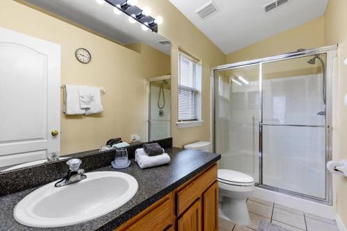 a bathroom with a sink and a shower at Davenport lake view private villa in Davenport