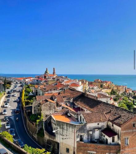 an aerial view of a city with the ocean at Dama Room in Vietri sul Mare
