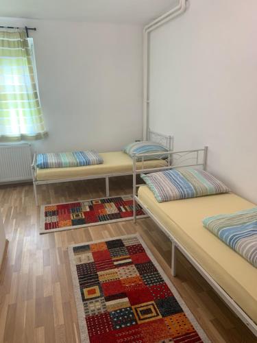 Giường trong phòng chung tại Wohnung am Griesplatz