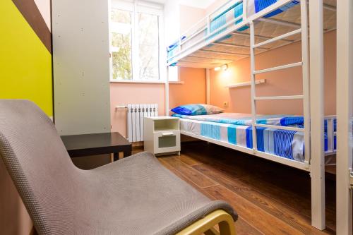 Postel nebo postele na pokoji v ubytování Domino Hostel