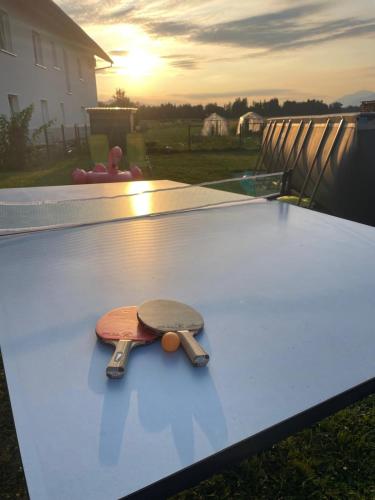 a skateboard sitting on top of a table at Spacious & Cozy Countryside Apartment in Šenčur