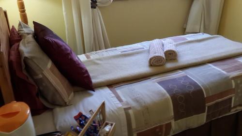 Katil atau katil-katil dalam bilik di The Old Mill Hotel