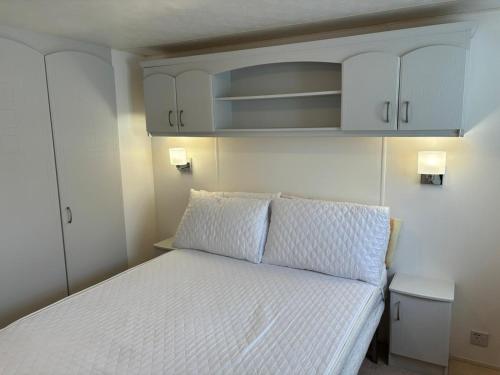 En eller flere senge i et værelse på WALSHS HOLIDAY PARK, Skegness