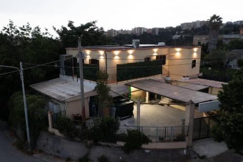 a house with lights on top of it at Chalet n5 Guest House in Catanzaro
