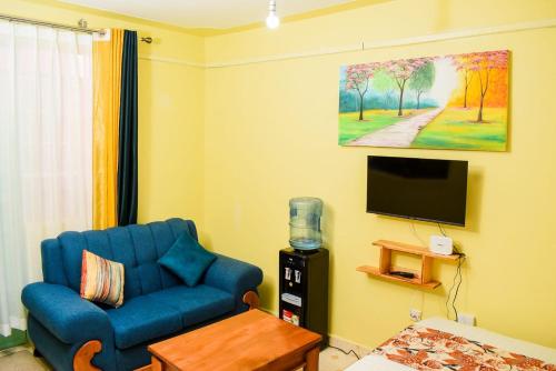 TV a/nebo společenská místnost v ubytování Shalom Apartments Moi Southlake