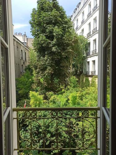 Chambres d'hôtes calmes sur jardin Paris Batignolles