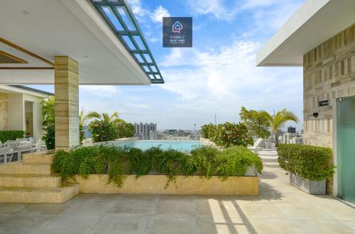 a view of a swimming pool from a building at Monaco Residences Piantini in Santo Domingo