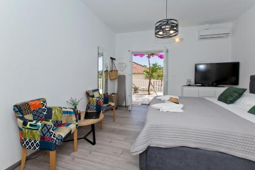 Postel nebo postele na pokoji v ubytování Apartments Juric