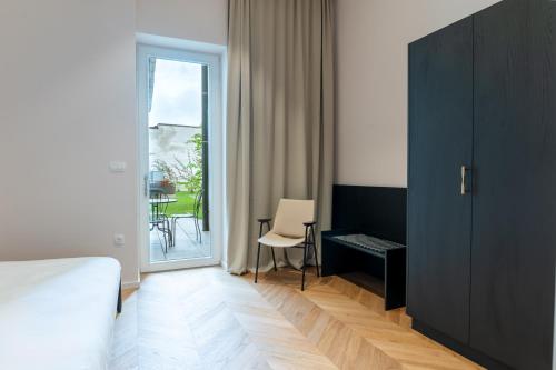 Ένα ή περισσότερα κρεβάτια σε δωμάτιο στο Villa Elizabeth - Apartment with Garden