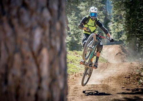 a person riding a bike on a dirt trail at Cozy Northstar Village Condo Walk to Lifts 2 Full BA Excellent Location in Truckee