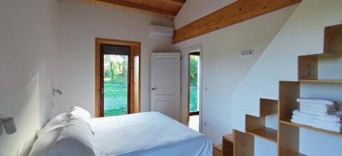 Ένα ή περισσότερα κρεβάτια σε δωμάτιο στο A casa de Foratoxo