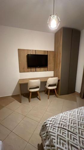 Giường trong phòng chung tại GREISON Vacation House