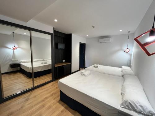 Postel nebo postele na pokoji v ubytování New "Villa Albero" Boutique