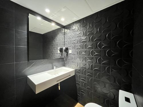 Koupelna v ubytování New "Villa Albero" Boutique