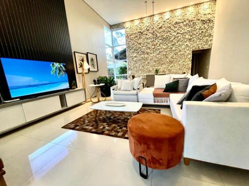 Μια τηλεόραση ή/και κέντρο ψυχαγωγίας στο Casa luxo 10 pessoas Gravatá com jacuzzi