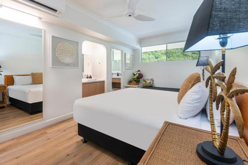 Postel nebo postele na pokoji v ubytování Whitsunday Apartments on Hamilton Island by HIHA