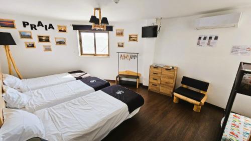 Ένα ή περισσότερα κρεβάτια σε δωμάτιο στο Atlantic Spot Guest House