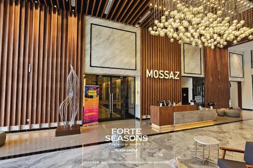 a lobby of a store with a chandelier at Forte Seasons Mossaz Premium Suites Petaling Jaya in Petaling Jaya