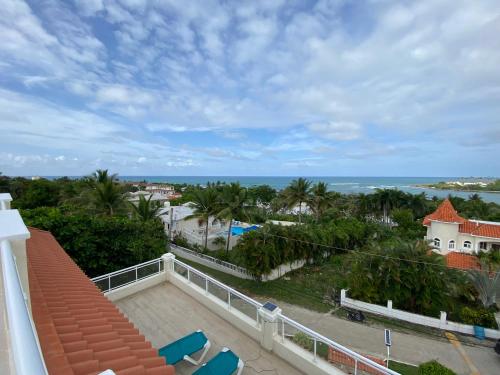 2 BR & 1WR Suite at Villa Costa Verde near Playa Cofresi, Puerto Plata with a pool, balcony, and a rooftop terrace