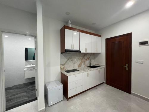 Kuchyň nebo kuchyňský kout v ubytování C-Hotel