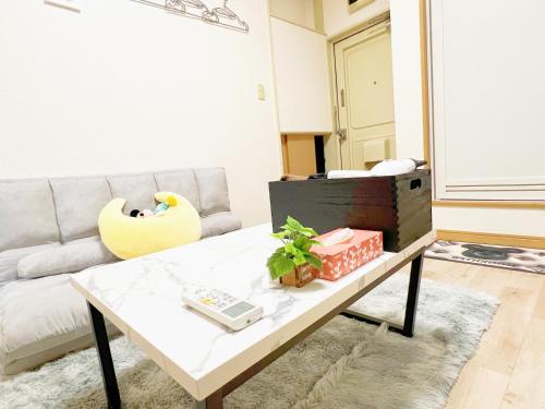 Un lugar para sentarse en 西武新宿線 駅近6人可 d1