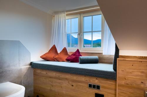 Postel nebo postele na pokoji v ubytování Design Hotel Frauenschuh