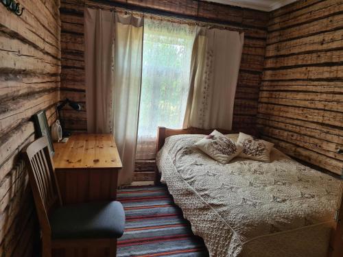 Postel nebo postele na pokoji v ubytování SIRELISURU KÜLALISTEMAJA