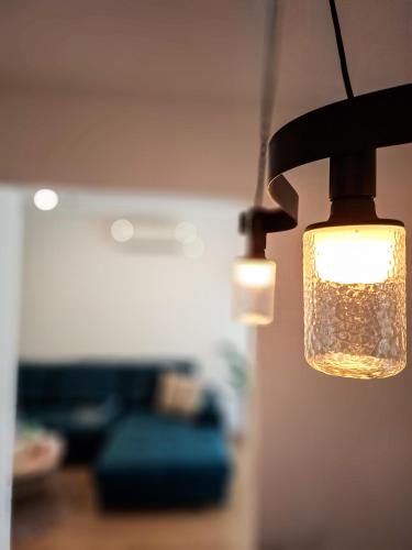 a close up of a light hanging from a ceiling at Apartman Divna in Ljubuški